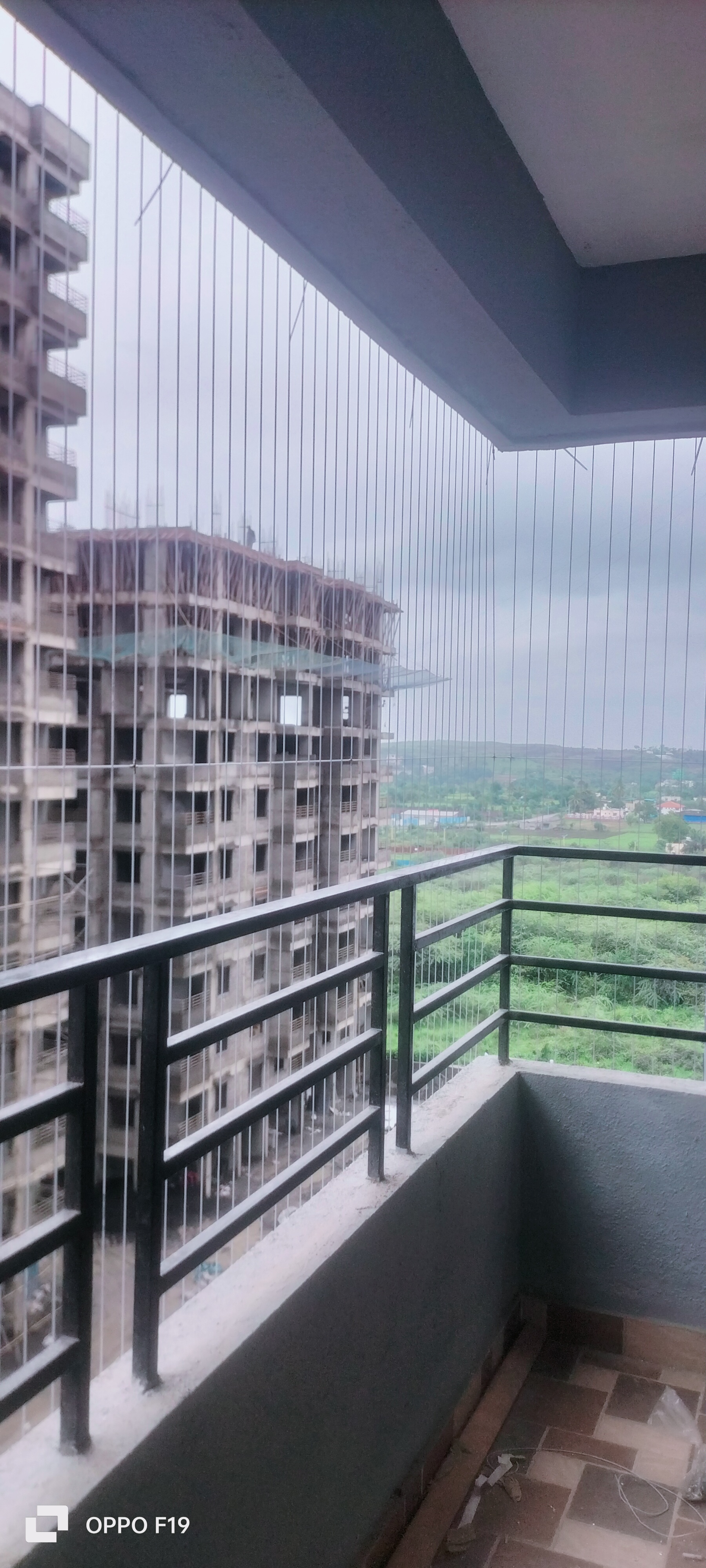 INVISIBLE CHILD SAFETY GRILL INSTALLATION IN HIGH-RISE BUILDINGS | Chirag Bird Netting Services | KHARADI, SAFETY GRILL IN KHARADI, STAINLESS STEEL GRILL IN KHARADI, INVISIBLE SAFETY GRILL IN KHARADI, PUNE, VIRAL, SAFETY.  - GL114381