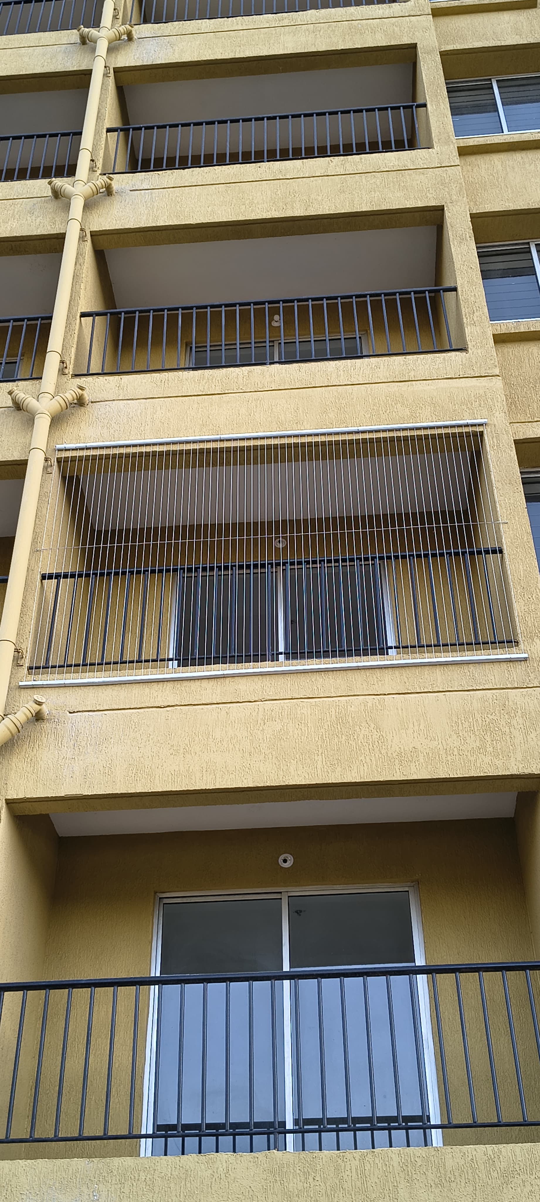 Invisible grill fitting for high rise building balconies | Chirag Invisible Safety Grill | INVISIBLE GRILL IN BAVDHAN, INVISIBLE GRILL SERVICE IN BAVDHAN, INVISIBLE SAFETY GRILL INSTALLATION IN BAVDHAN, INVISIBLE CHILD SAFETY GRILL IN BAVDHAN, INVISIBLE GRILL PUNE  - GL120304