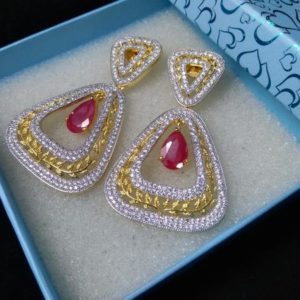 Ruby american diamond earrings  | IndiHaute | Ruby american diamond earrings online , Ruby american diamond earrings online shopping , Ruby american diamond for girls , Ruby american diamond earrings for women, Ruby american diamond earrings - GL44584
