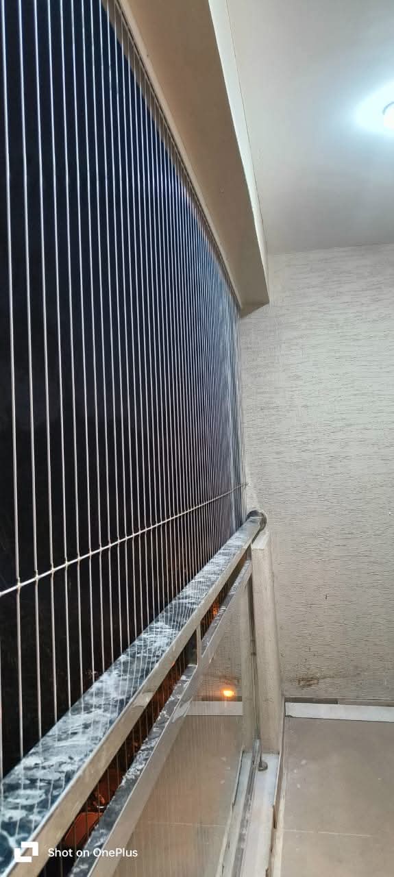 Children safety invisible grill for highrise building in Ravet, Kiwale, Punawale, Tathawade, Wakad, Hinjewadi, Bhumkar chowk, pimpri and chinchawad. | Chirag Invisible Safety Grill | INVISIBLE GRILL Manufacturer IN PUNE, INVISIBLE GRILL DEALER IN PUNE, INVISIBLE GRILL Wholesalers IN PUNE, INVISIBLE GRILL FITTER IN PUNE. - GL119987